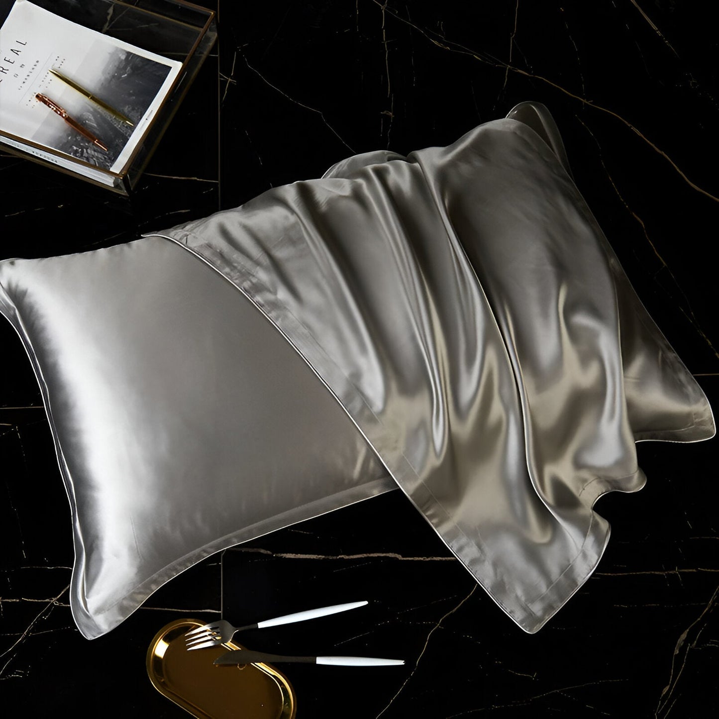 Amari Silk Lyocell Pillowcase - Close Up Of Pillowcases - Black Background - Silver