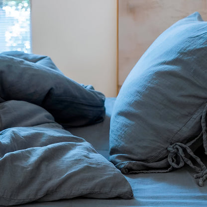 Ashley Washed Cotton Bedding Set - Side View - Close Up On Pillowcase - Blue