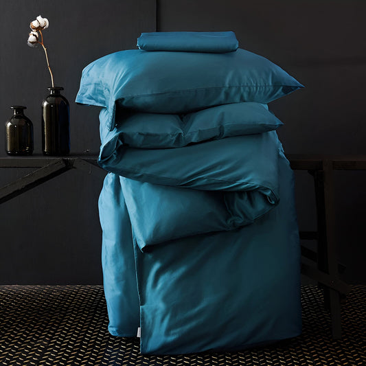 Kendall Egyptian Cotton Bedding Set - Duvet cover and pillowcase neatly packed on a black background - Azure