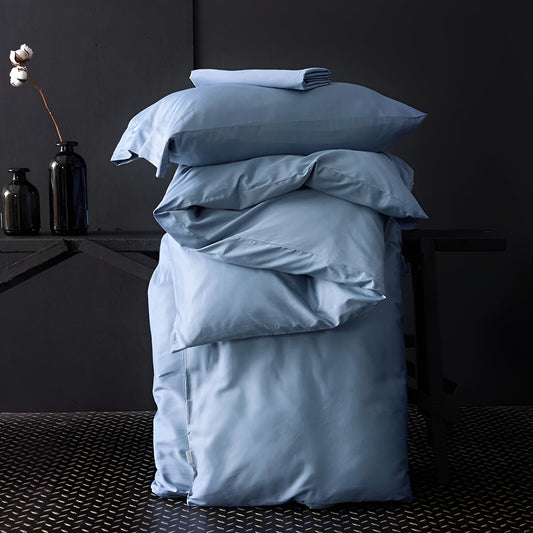 Kendall Egyptian Cotton Bedding Set - The Whole Bedding Set Neatly Packed On A Black Background - Baby Blue