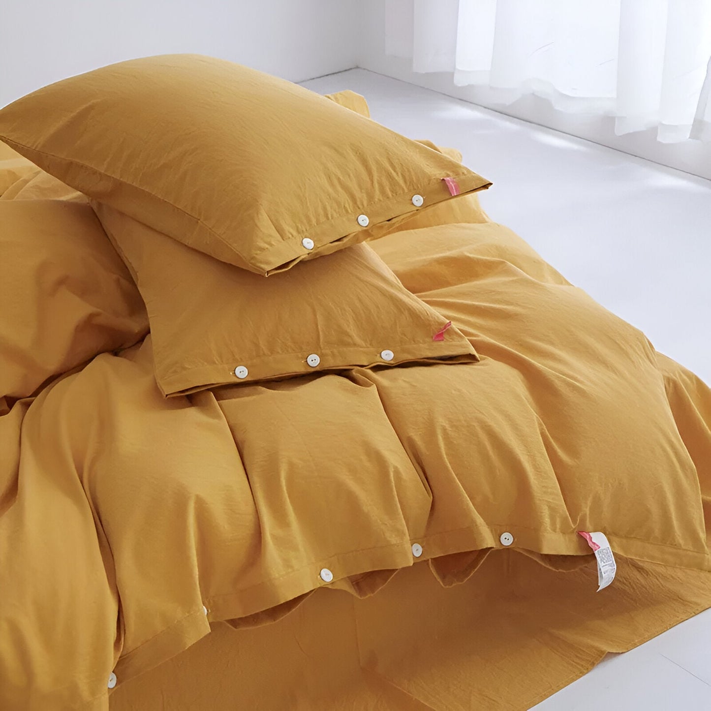 Stella Washed Cotton Bedding Set - Close Up Of Button Closure - Yellow